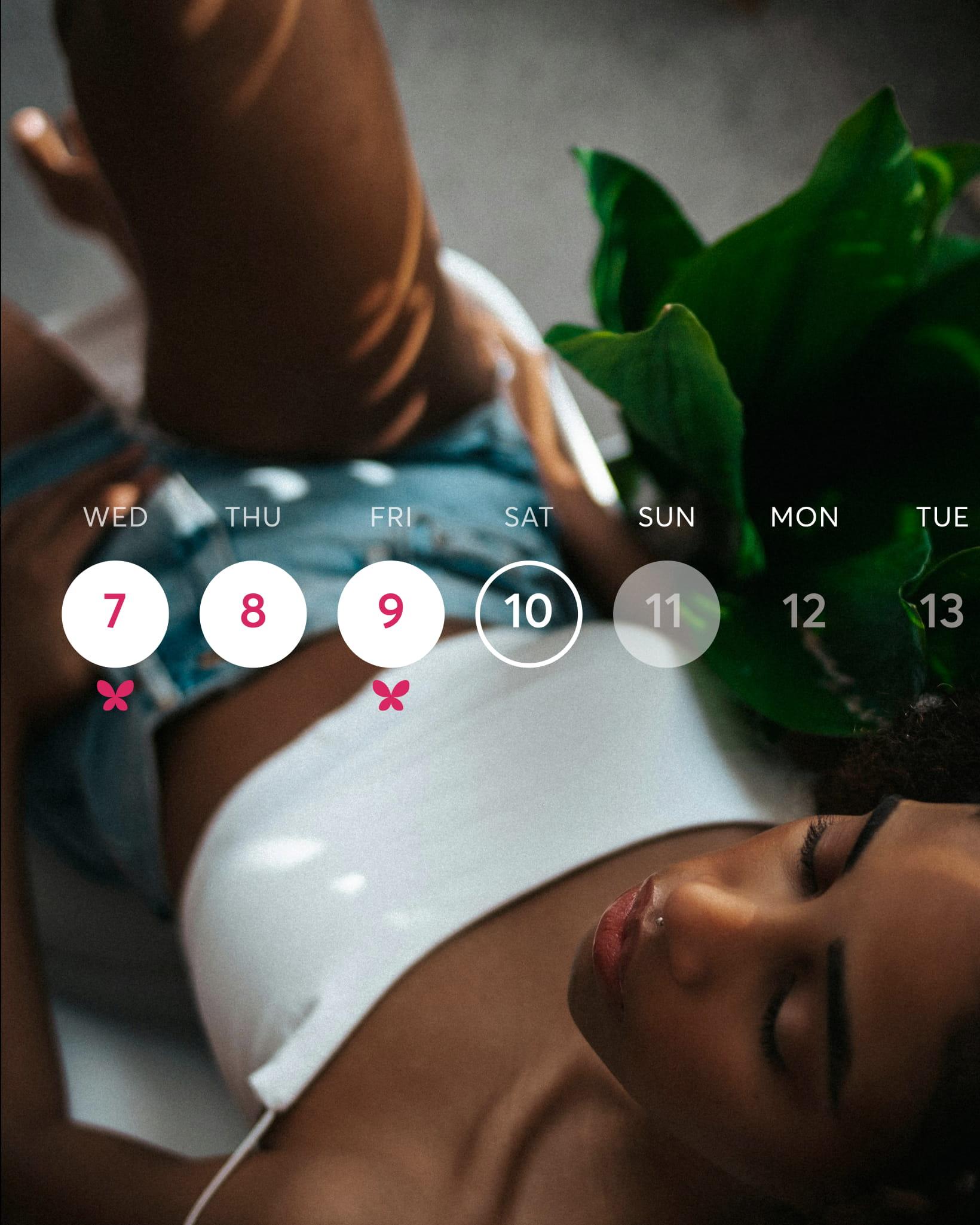 Overhead lifestyle photograph of a woman lying down beside a houseplant, overlaid with the 28X weekly calendar showing tracked period days.