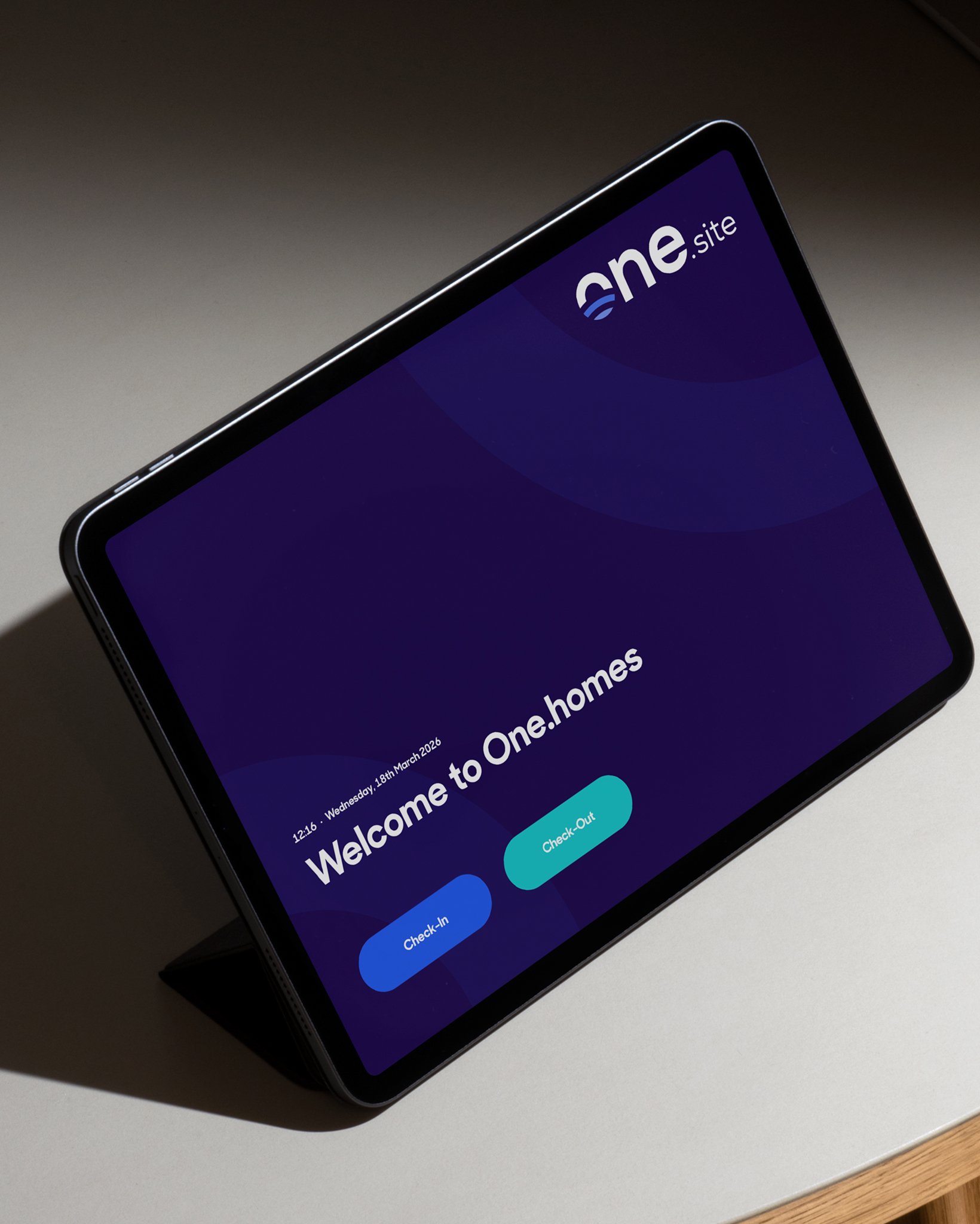 The One.site facial recognition interface showing a successful match and check-in confirmation.