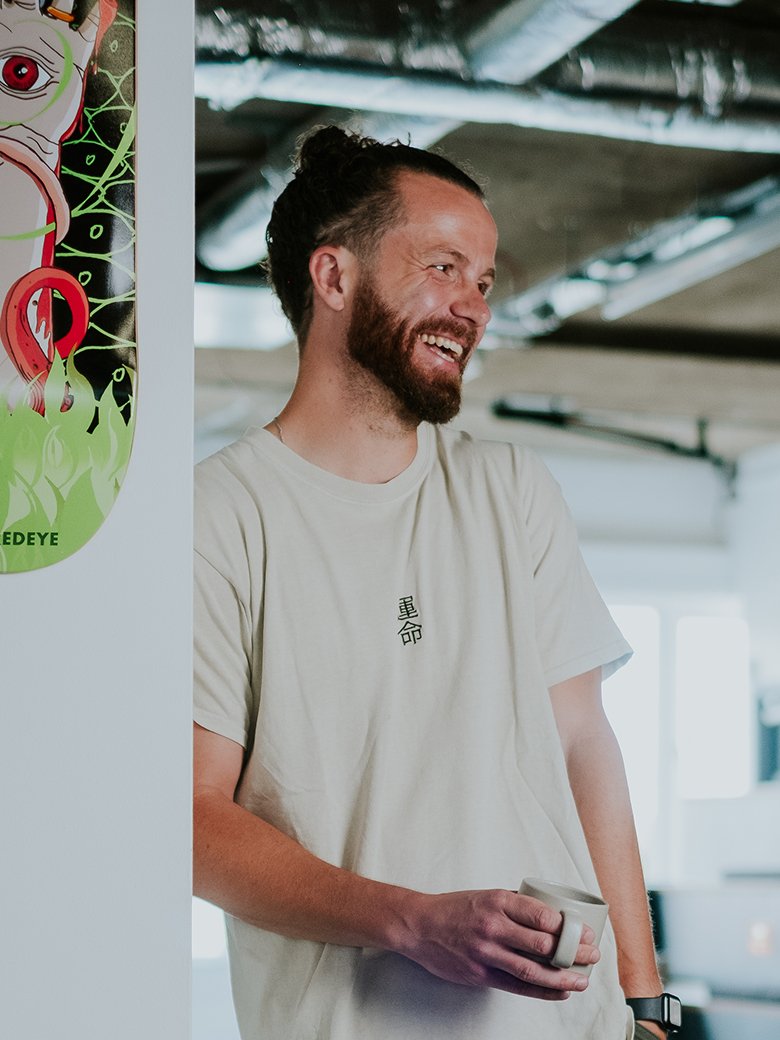 Tom Marshall sitting in an office environment