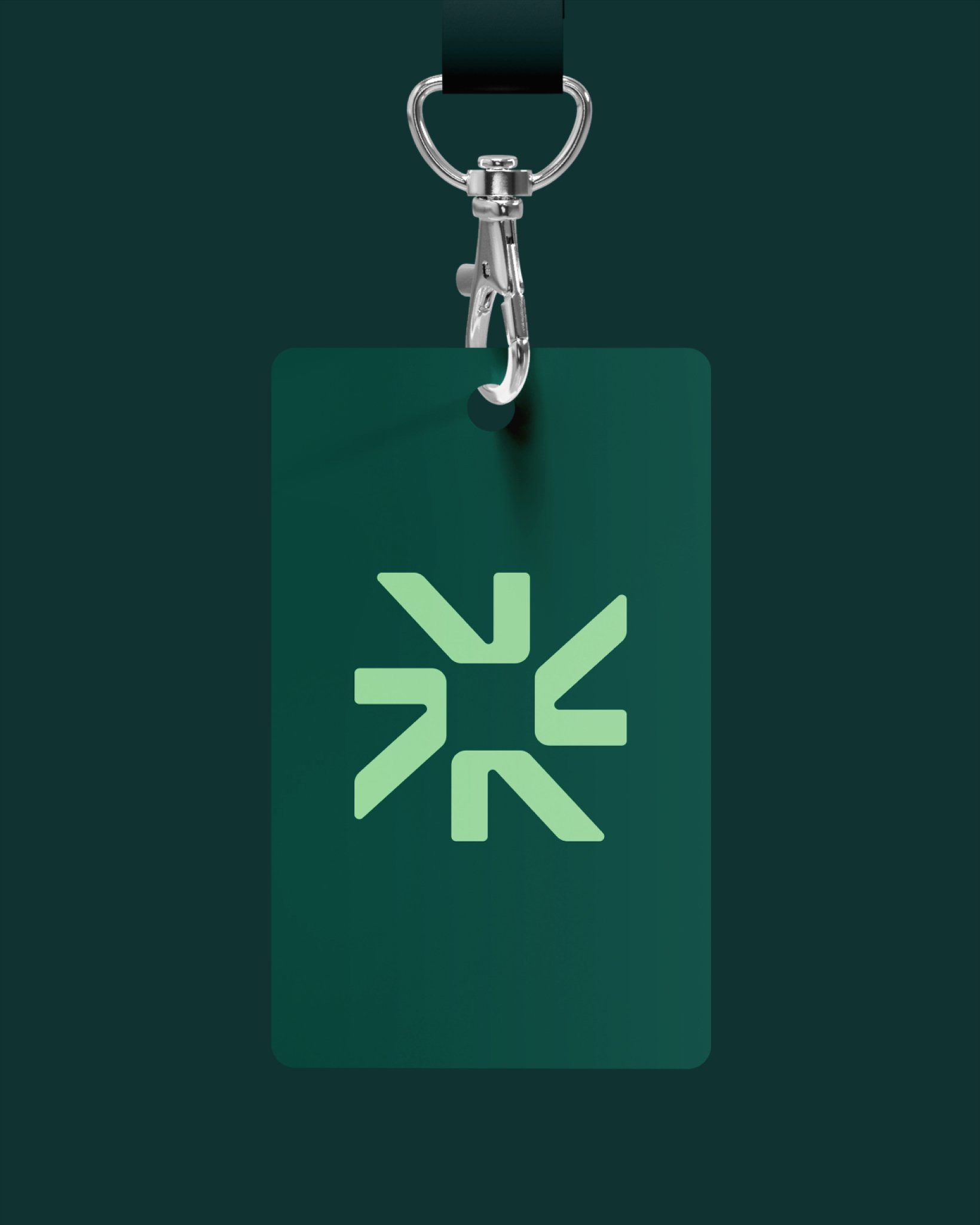 A dark green ID badge featuring the Bellrock symbol in light green, attached to a metal clip and lanyard.