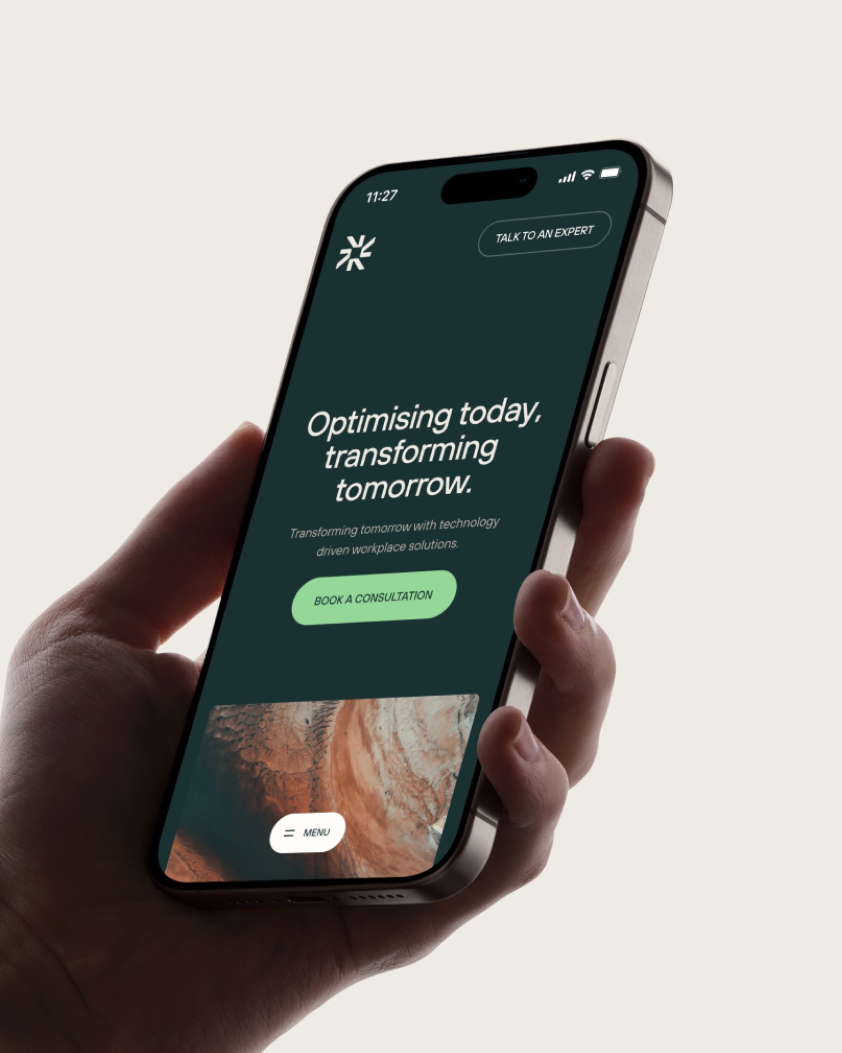 A person holding a smartphone displaying the Bellrock website with the message “Optimising today, transforming tomorrow” and a button to book a consultation.