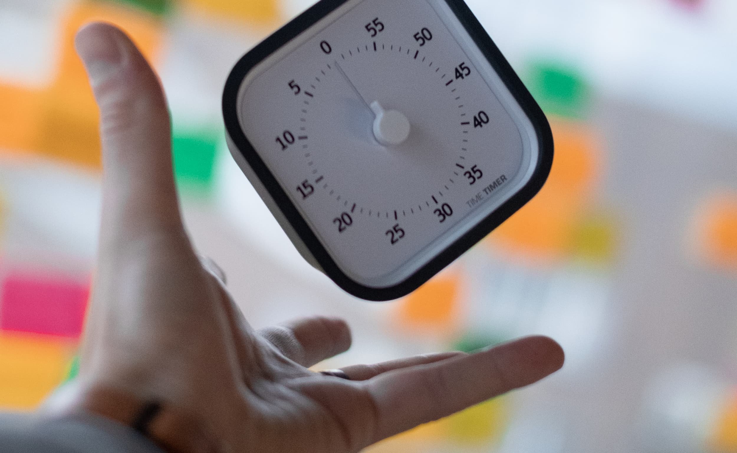 Timer being tossed in the air in a digital strategy workshop