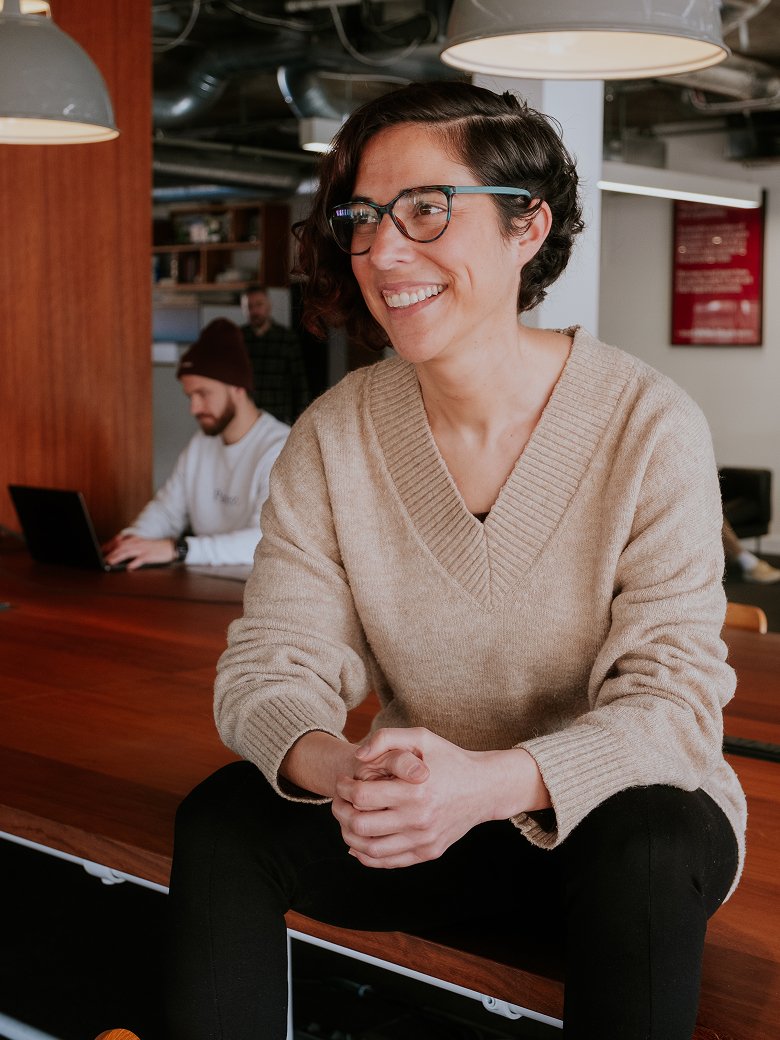 Carmen López sitting in an office environment