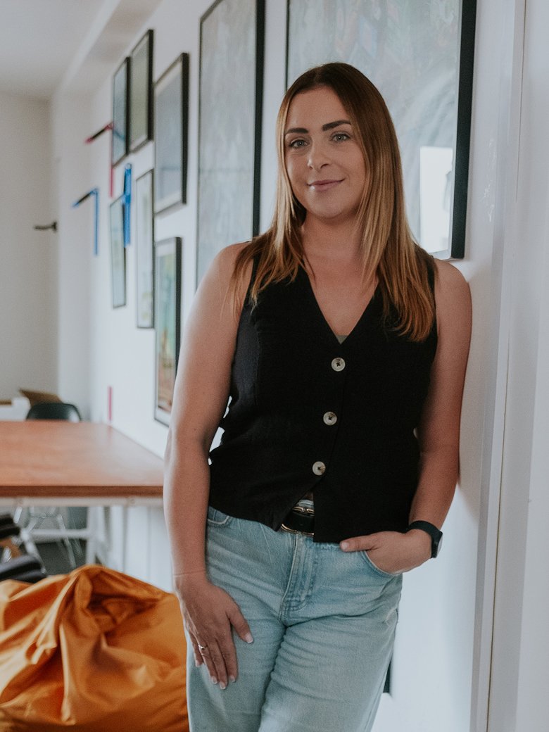 Chloe Edwards sitting in an office environment