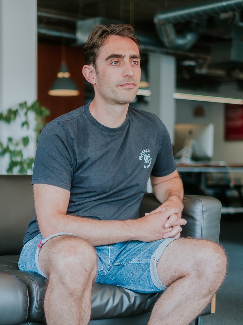 David Cocks sitting in an office environment