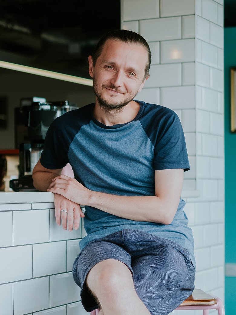 Dave Quilter sitting in an office environment