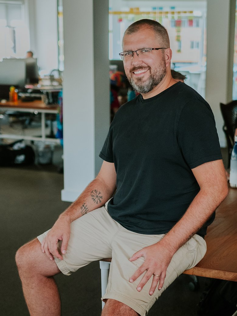 Harry Ford sitting in an office environment