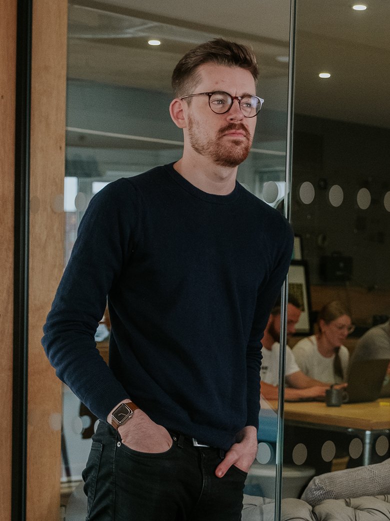 Henry Price sitting in an office environment