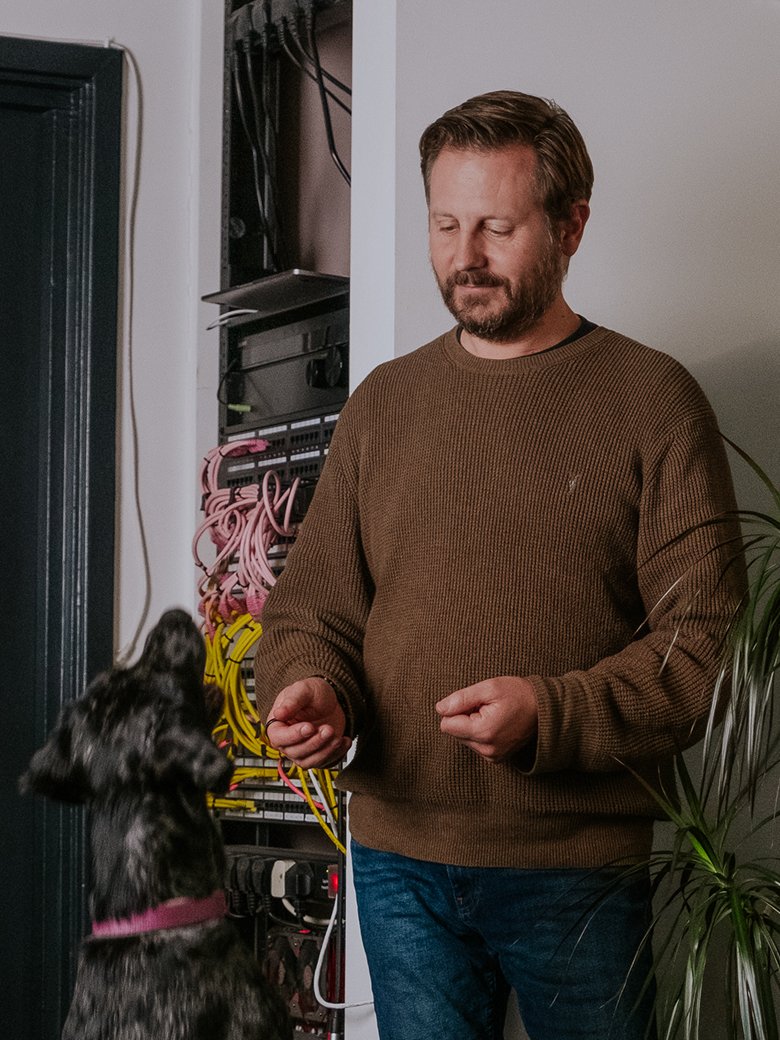 Nick Linnell sitting in an office environment