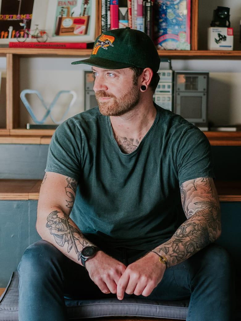 Pete White sitting in an office environment