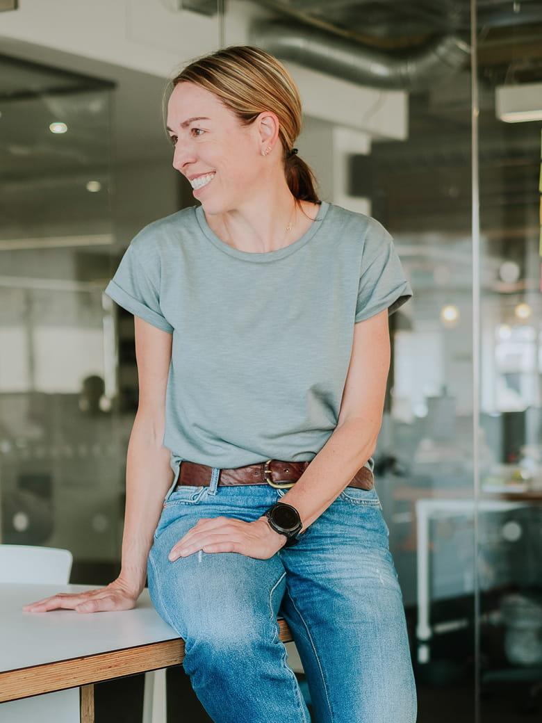 Rebecca Brennan sitting in an office environment