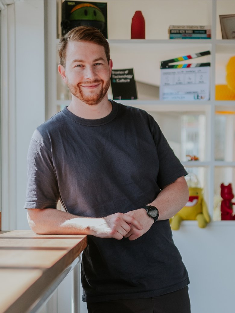 Rob Wills sitting in an office environment