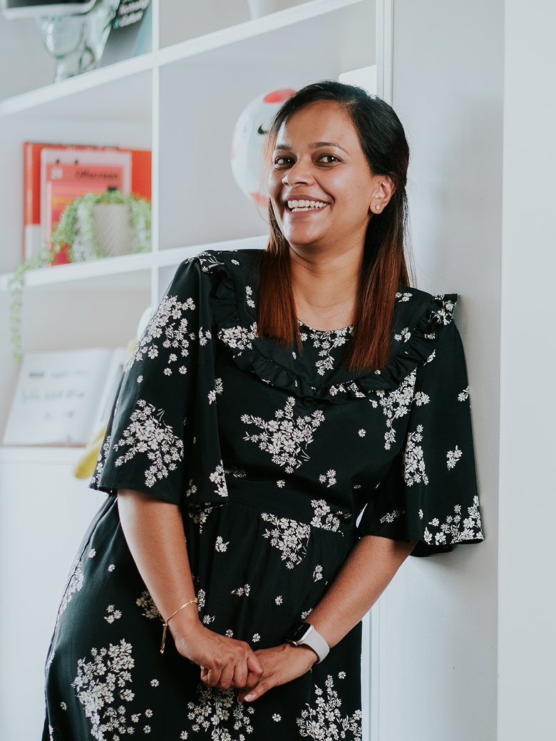 Tharindra Perera sitting in an office environment