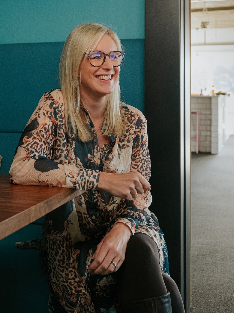 Zoë Turner sitting in an office environment